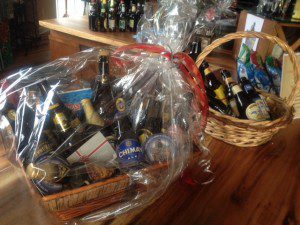 A basket full of beer bottles on a table.